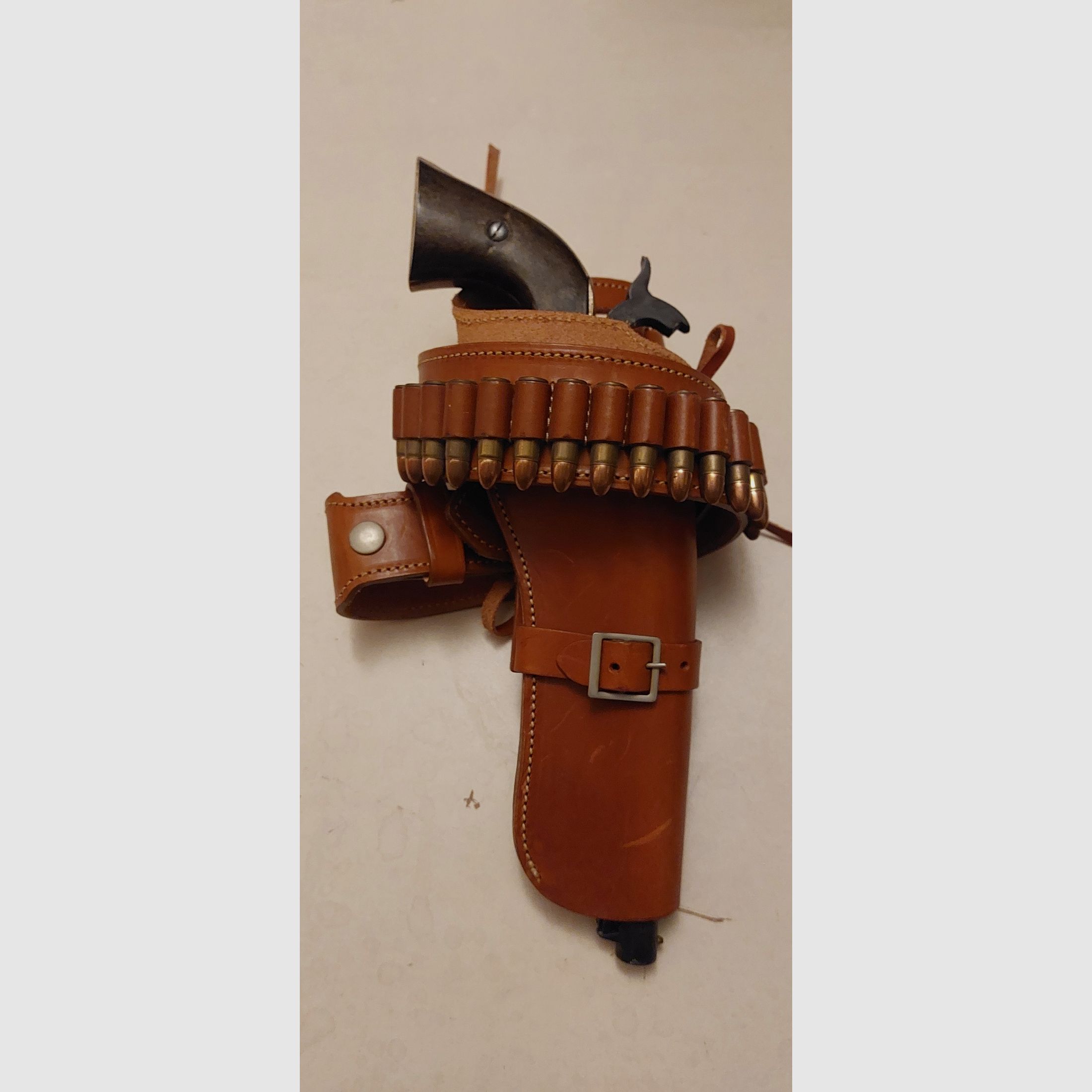 Western colt with holster and dummy cartridges