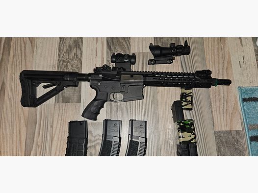 G&G CM16 E.T.U SRL S-AEG inklusive 4 Mid- Caps und 1 High Cap + 2x ACOG Visiere eines von Novritsch