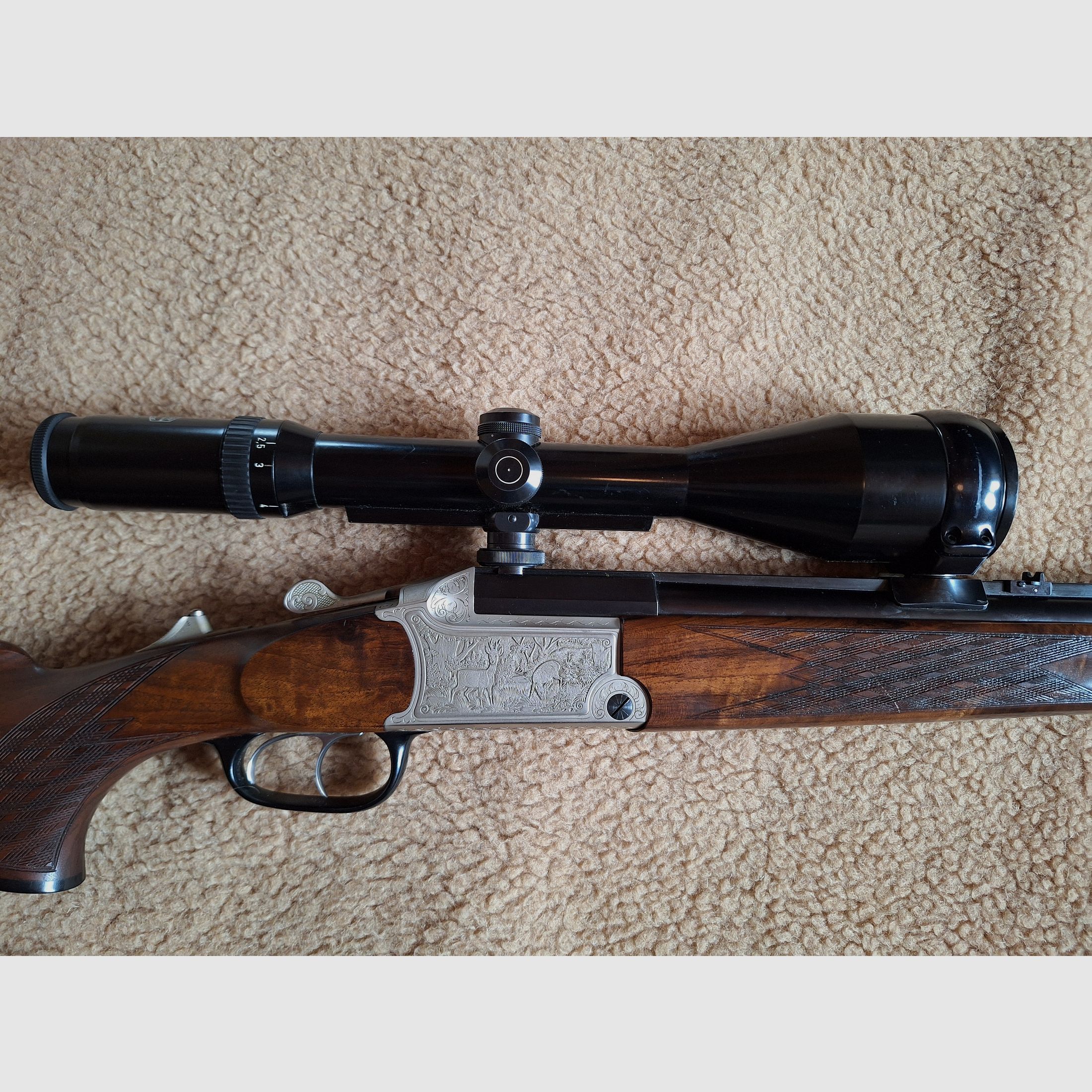 Escopeta combinada de Blaser, modelo BBF 700/88, calibre 12/70 cañón de escopeta, .30-06 cañón de rifle, visor Schmidt & Bender 2,5 - 10x