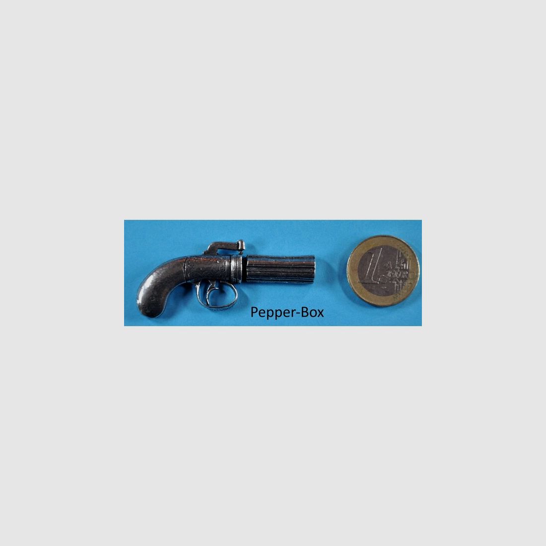 Bündel-Revolver Pepperbos als Metall-Anstecker