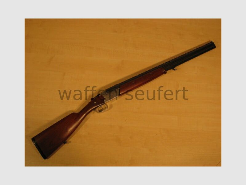 Toz 34EP over-and-under shotgun with ejector