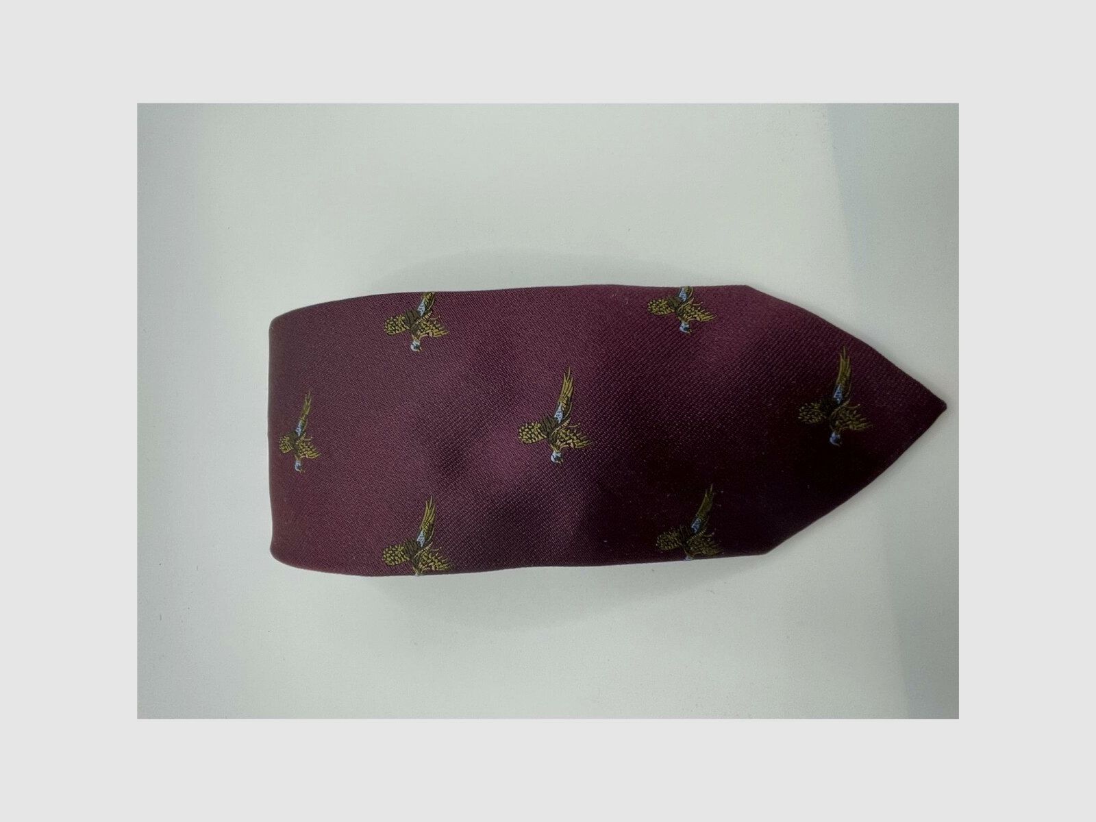 Robert Keyte tie 100% silk burgundy design of a strutting pheasant