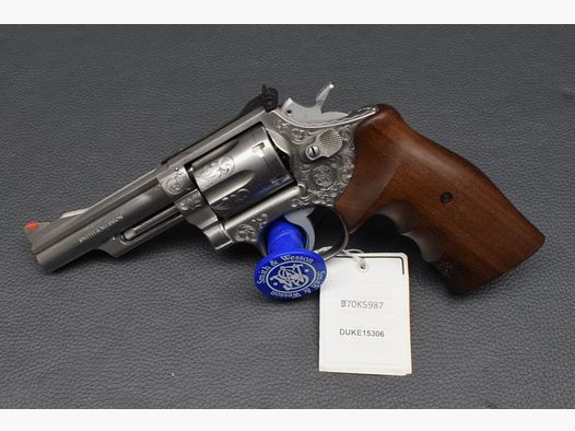 Smith & Wesson Modell 66-4, 4", Kal. 357 Mag, graviert, sehr gut