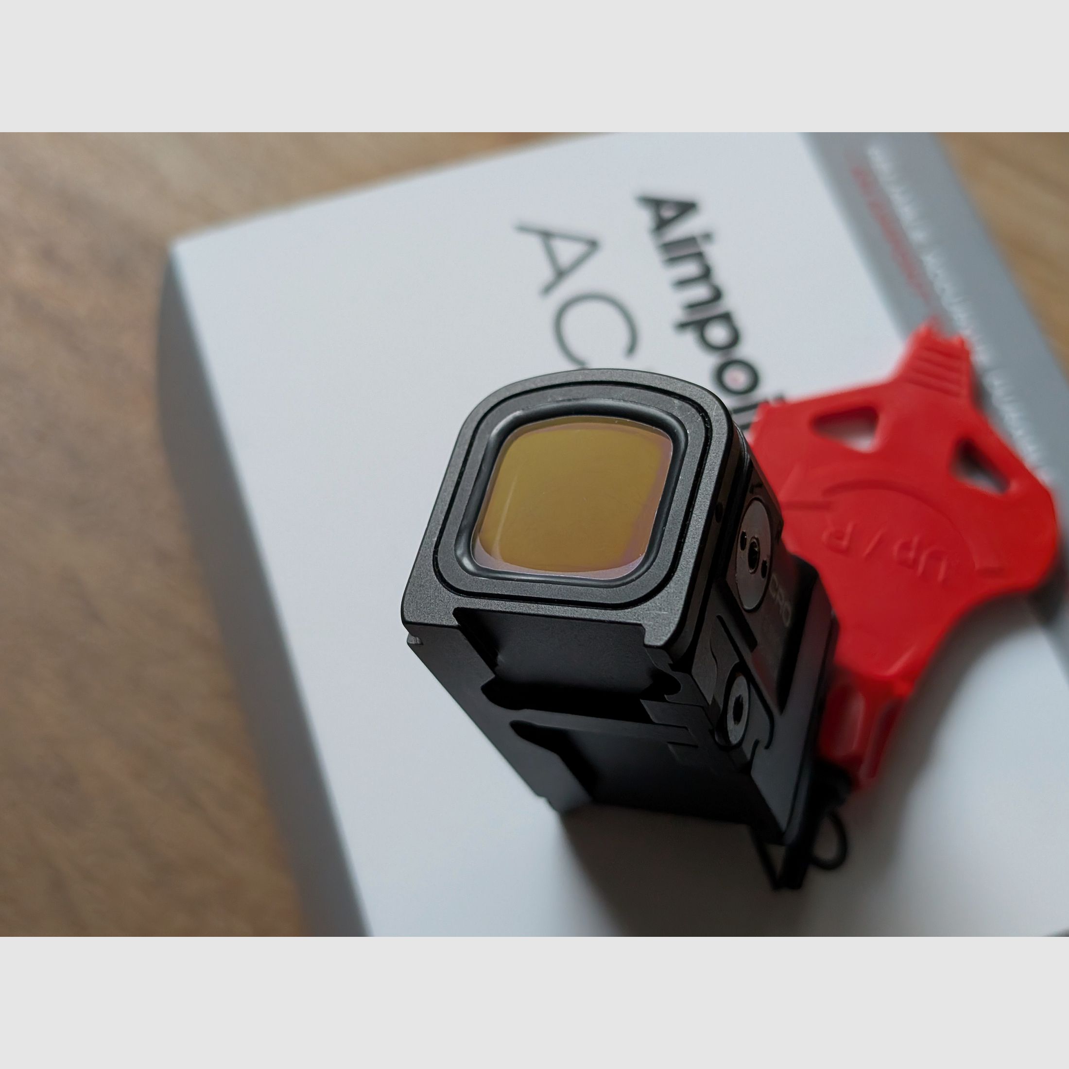 Two months old Aimpoint ACRO C-2 with receipt