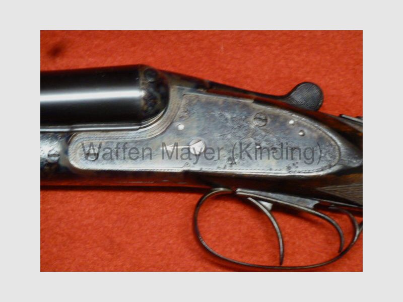 Fusil à double canon avec serrure latérale Suhl