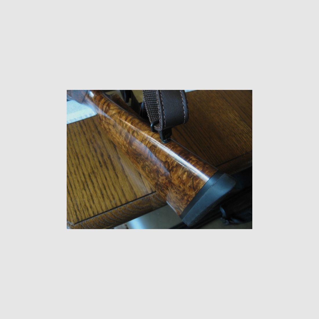 Absolutely UNIQUE COLLECTOR'S ITEM = Almost like new "Custom STEEL SYSTEM completion" with HAND-MODELED FULL ENGRAVINGS for R93, with custom-made right-handed semiweight stock and Category-11!! System is still one WITHOUT serial number!! Includes Blaser leather rifle sling!, image 15 of 17