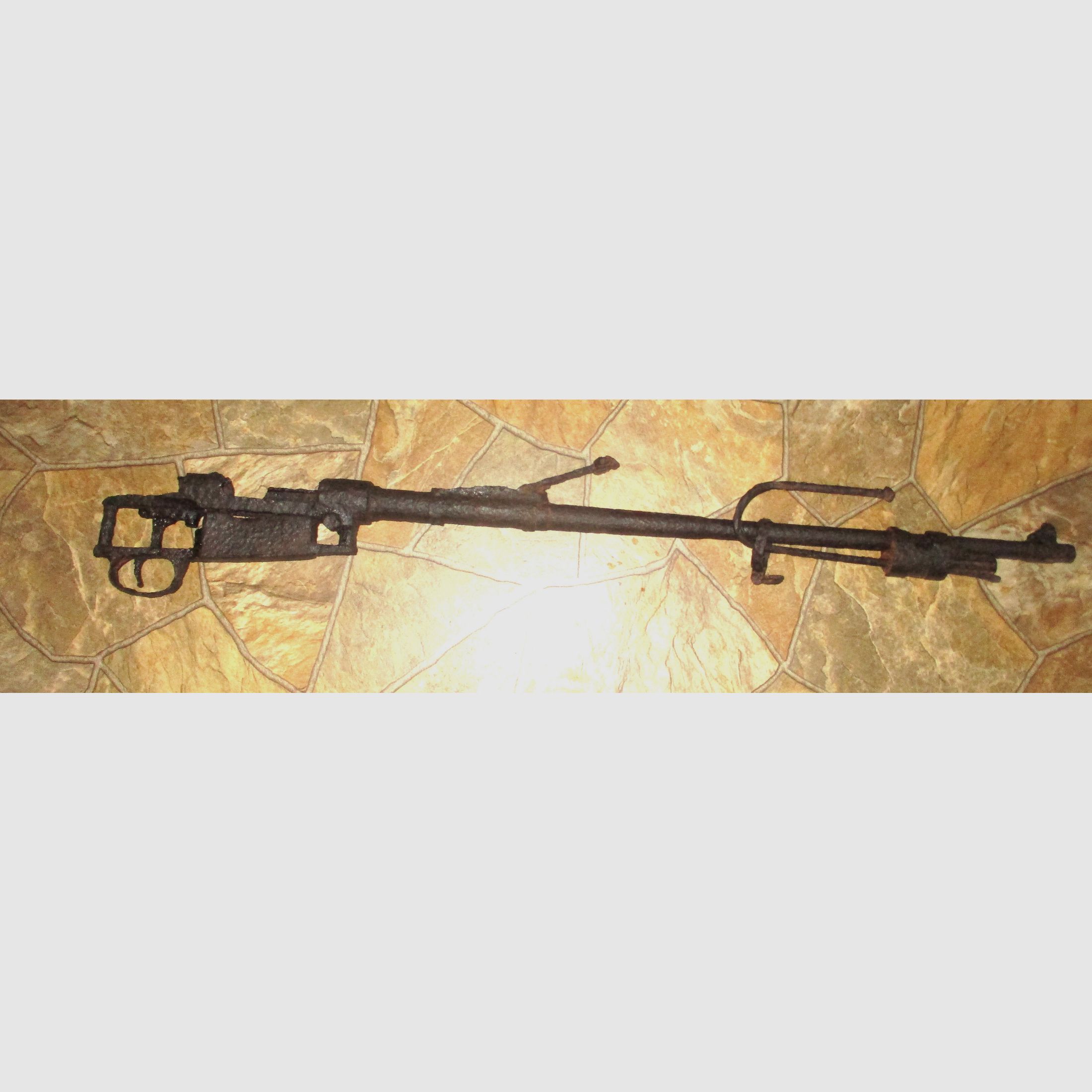 old rifle from World War I or II, decorative barn find