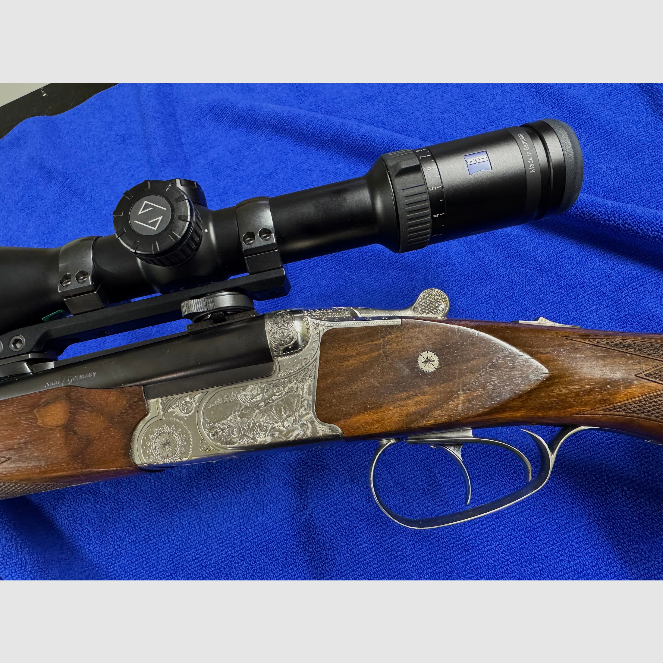 Merkel Doppelbüchsdrilling DR 961L avec lunette ZEISS Victory HT 3-12x56