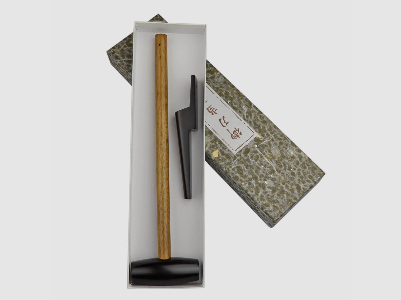 Hammer and splint made of ebony for katana disassembly
