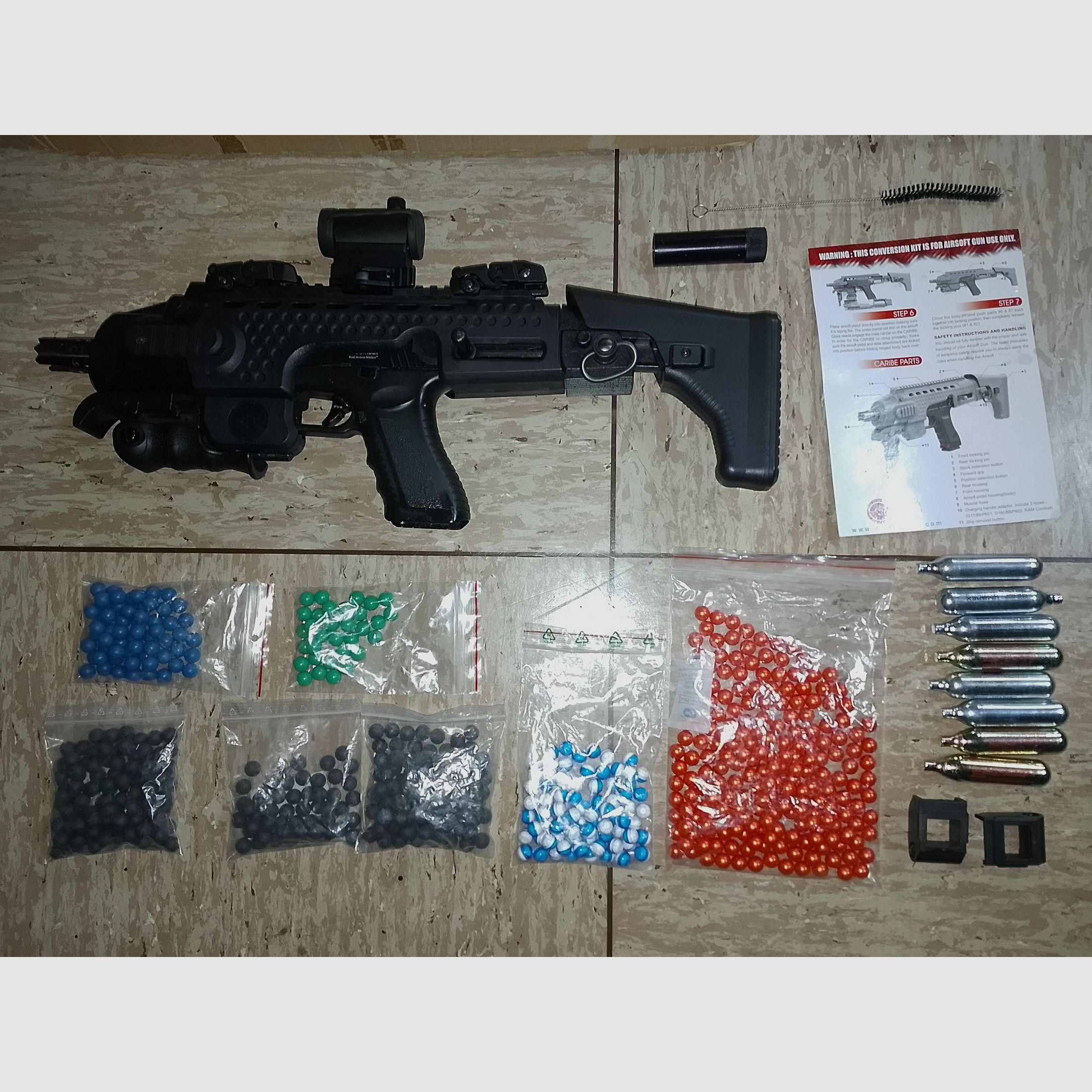 RAM Cal .43 Combat (Glock) + 4 Magazine + Aps Caribe Action Conversion Kit T1-Socom Visier und Zubehör Co2 Fastballs + Paintballs