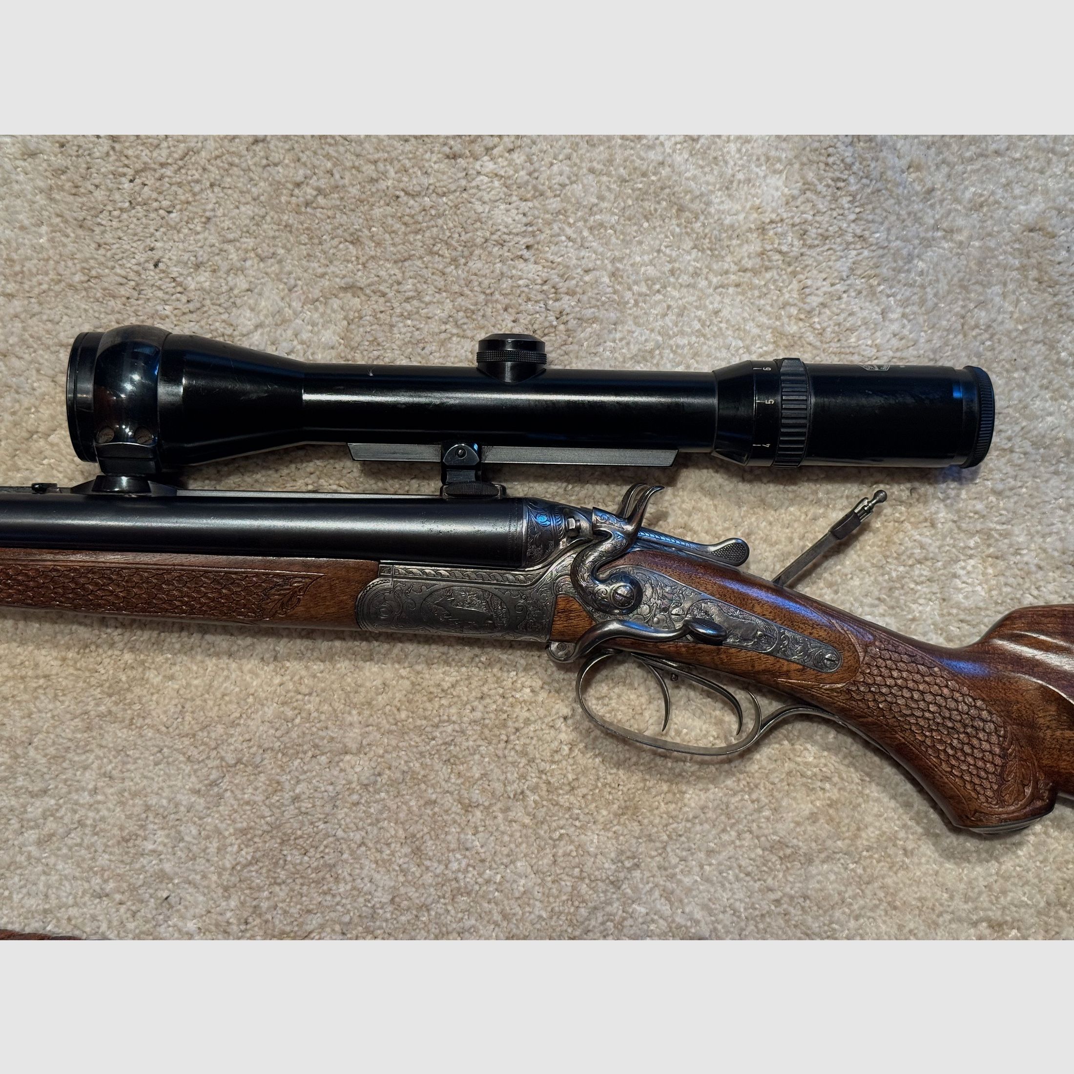 Sauer & Sohn Hahndrilling mit Seitenöffnung und kurzem Einstecklauf  |  KAL .30-30Win  |  16/70 |  .22 Magn. LFB