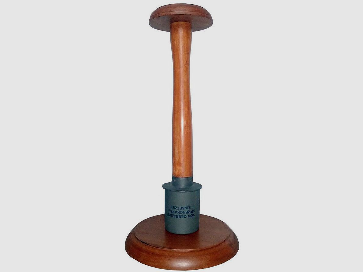 Helmet stand for steel helmet as stick grenade
