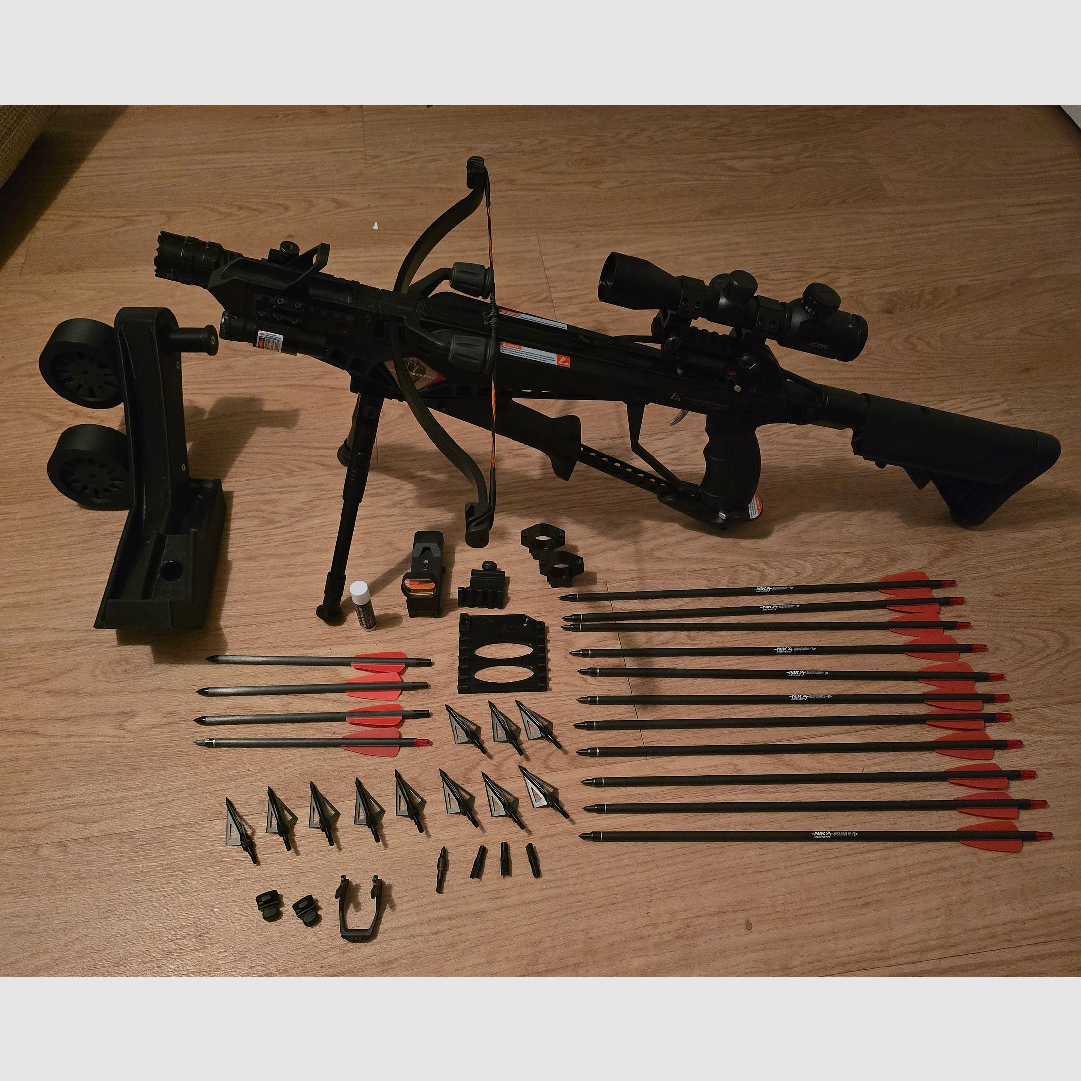 An Archery Cobra RX130 Sniper Crossbow with a lot of accessories