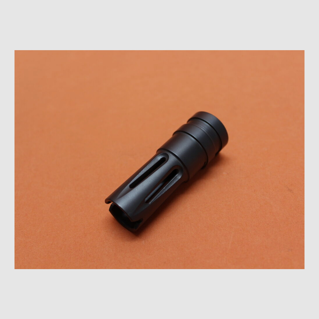 Steger Steyr Mannlicher AUG-Z: Muzzle flash suppressor Steger clamp attachment for barrel Ø 19.8mm, blued steel