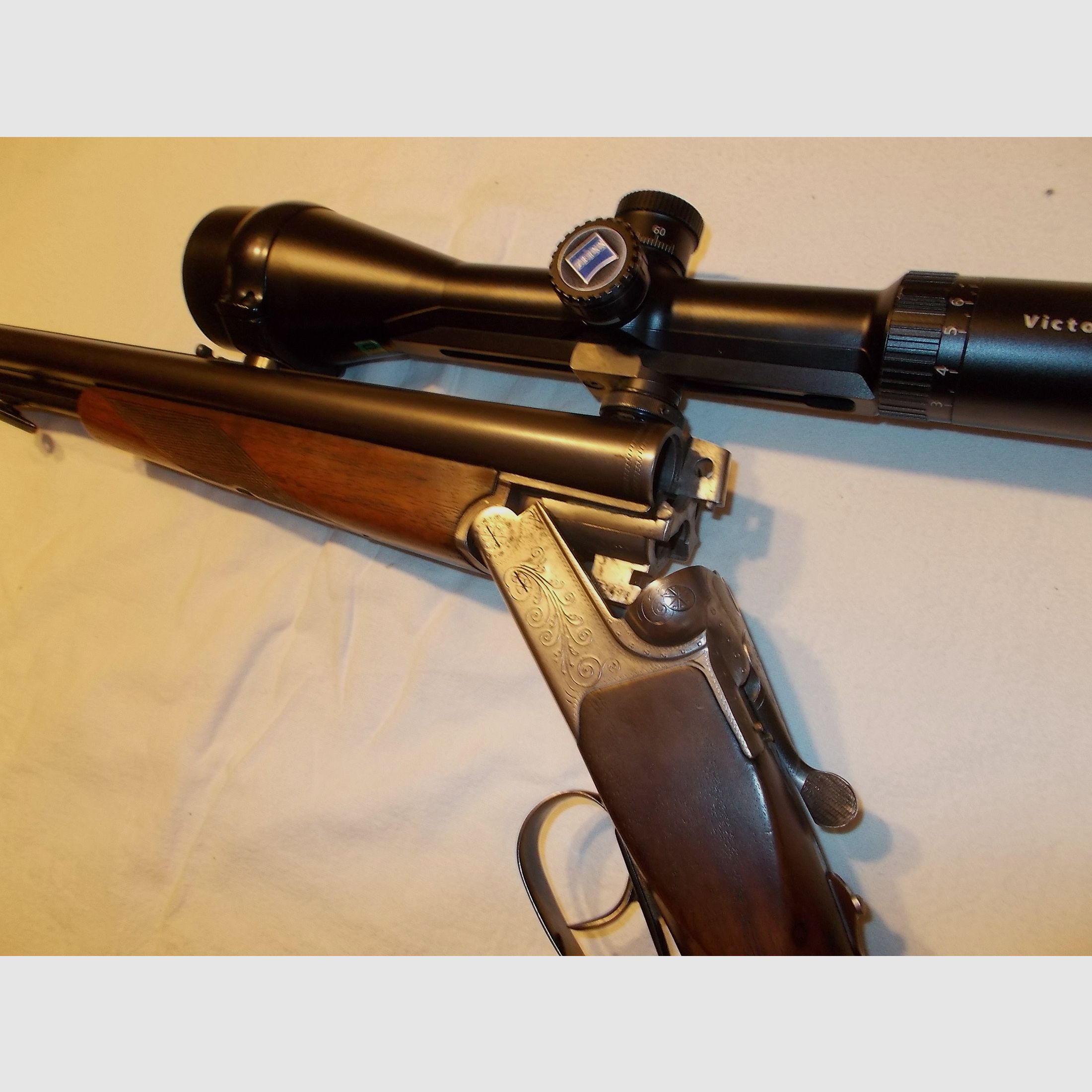 Suhler Jagddrilling 7x65R 12/70 mit Zeiss Diavari Optik mit Leuchtpunkt