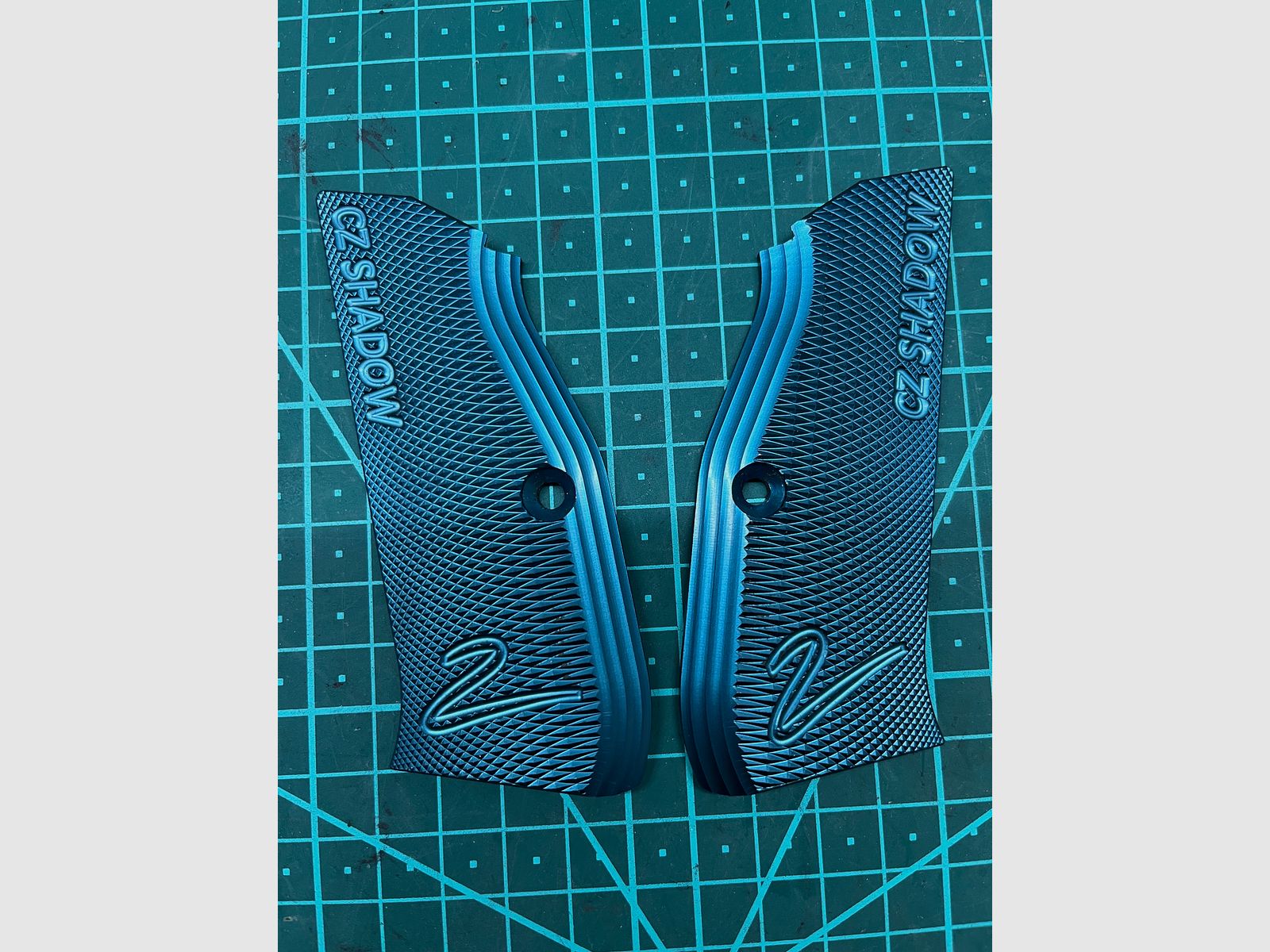 Shadow 2 grips blue anodized.