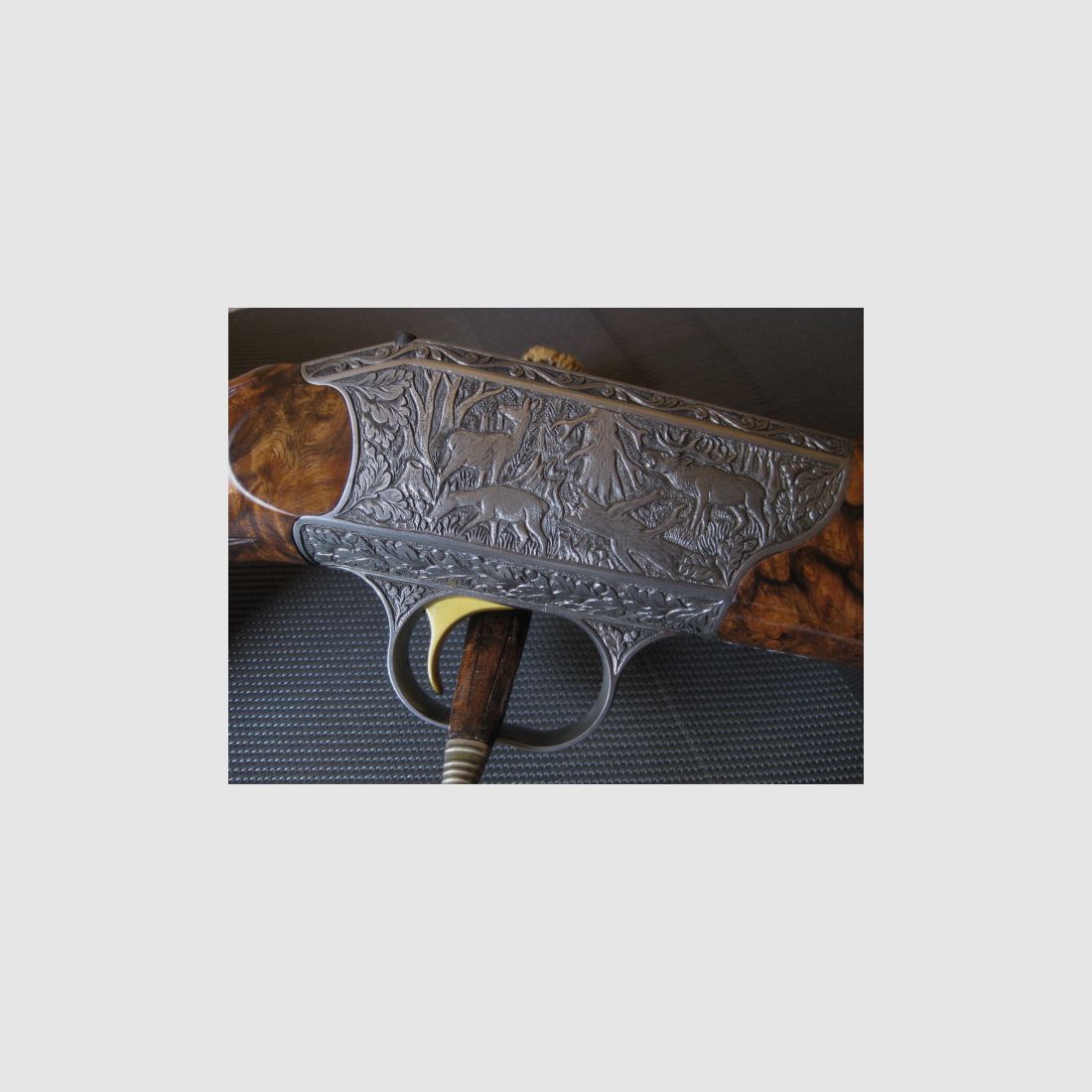 Absolutely UNIQUE COLLECTOR'S ITEM = Almost like new "Custom STEEL SYSTEM completion" with HAND-MODELED FULL ENGRAVINGS for R93, with custom-made right-handed semiweight stock and Category-11!! System is still one WITHOUT serial number!! Includes Blaser leather rifle sling!, image 16 of 17