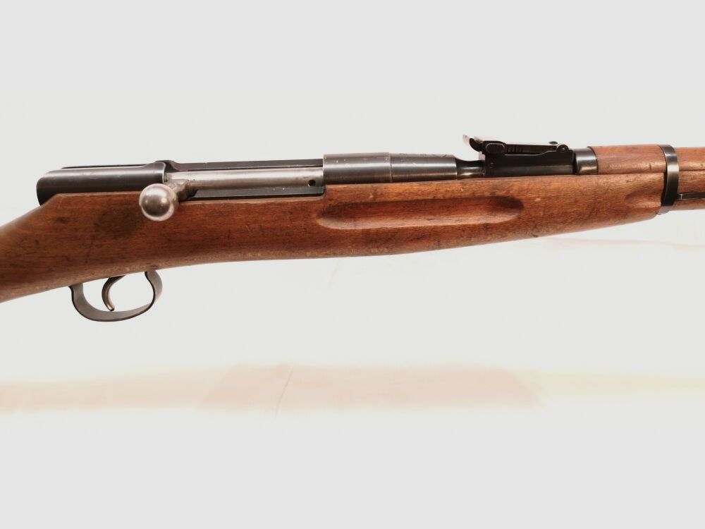 Karabin treningowy Mosin Nagant - karabin treningowy, z numerami zgodnymi, przedni metalowy uchwyt w kolorze brązowym.