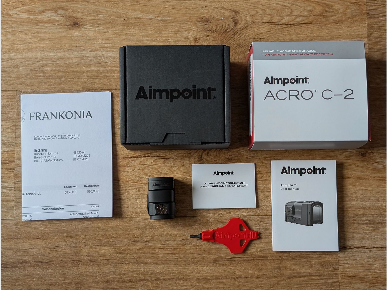 Two months old Aimpoint ACRO C-2 with receipt
