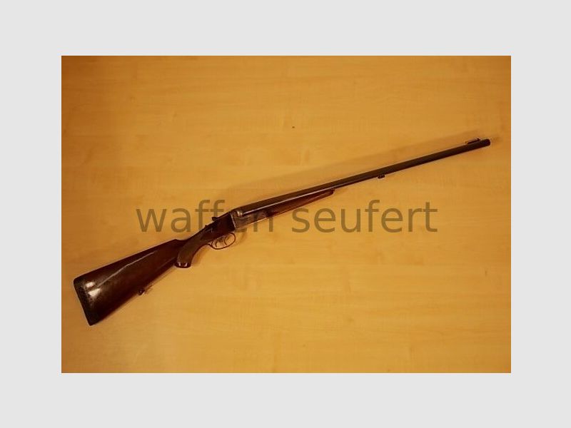 Forest double-barreled shotgun colored and engraved