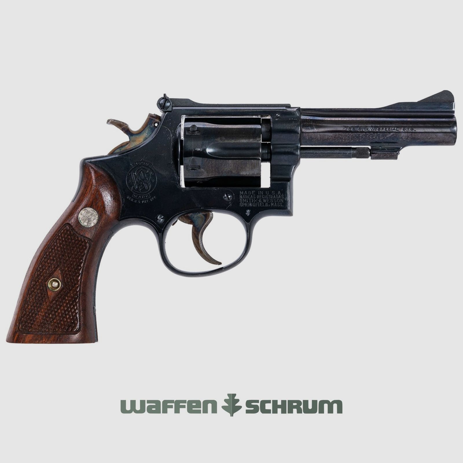 Smith & Wesson Mod. 15-2 .38Special, adjustable sight, wooden grips, blued, barrel length: 4 inches