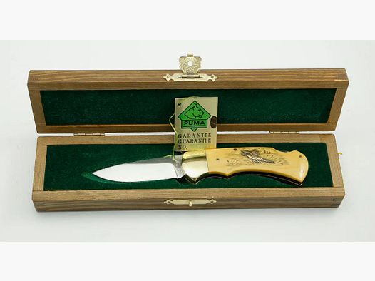 (Rarities) Puma 4-Star 715 with brass inlays duck and pheasant, warranty card, 1983