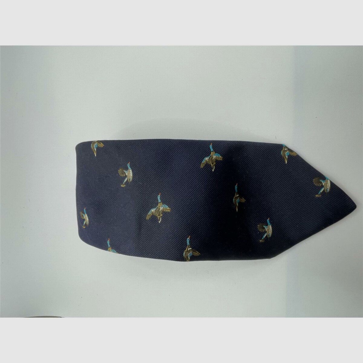 Corbata Robert Keyte 100% seda azul motivo pato