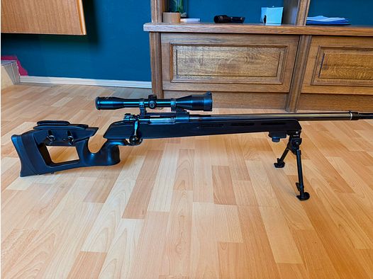 Sporting bolt-action rifle based on FN 30-11 Belgian sniper rifle for right- and left-handed shooters