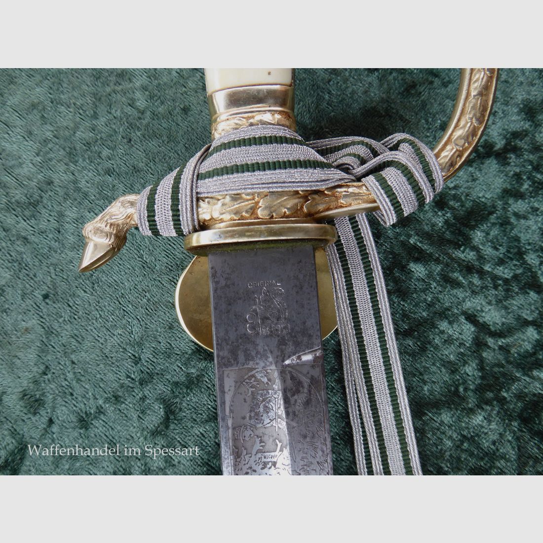 Stag knife with a guard vessel in ornate design from the time of World War II.
