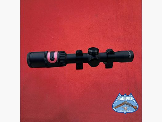 Trijicon AccuPoint 1.25-4×24 riflescope with illuminated reticle and detachable Warne scope rings