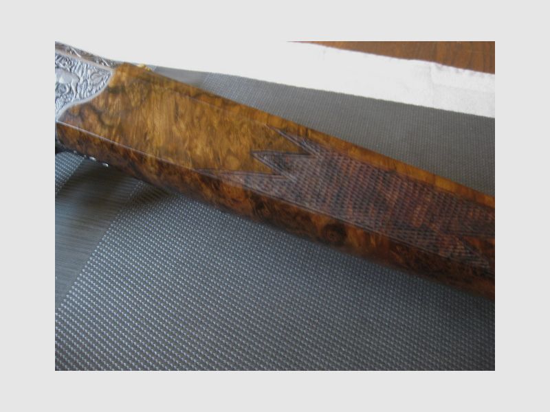 Absolutely UNIQUE COLLECTOR'S ITEM = Almost like new "Custom STEEL SYSTEM completion" with HAND-MODELED FULL ENGRAVINGS for R93, with custom-made right-handed semiweight stock and Category-11!! System is still one WITHOUT serial number!! Includes Blaser leather rifle sling!, image 9 of 17