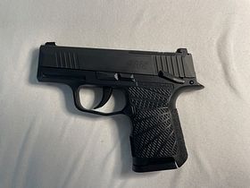 Sig Sauer P365, Wilson Combat grip, OR with manual safety