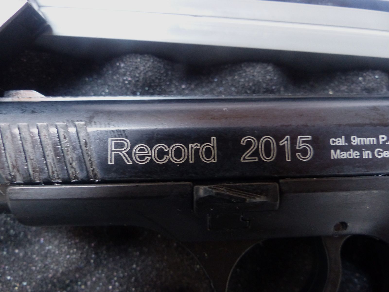 Record 2015 Cal. 9mm PAK New with case, blank firing adapter, brush, manual from collection plus 50 rounds of ammunition
