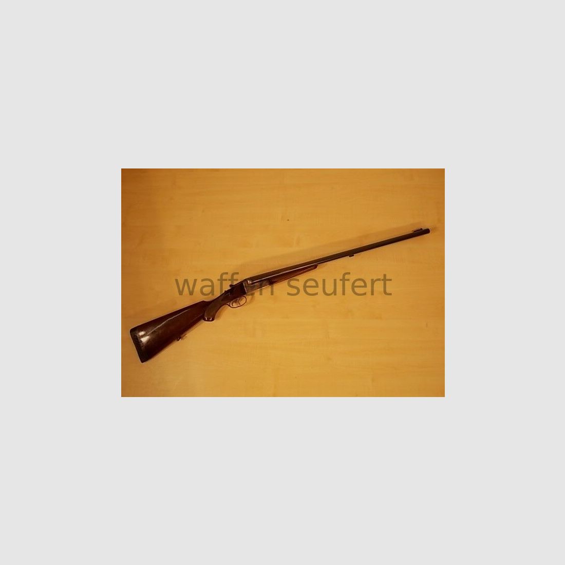 Forest double-barreled shotgun colored and engraved