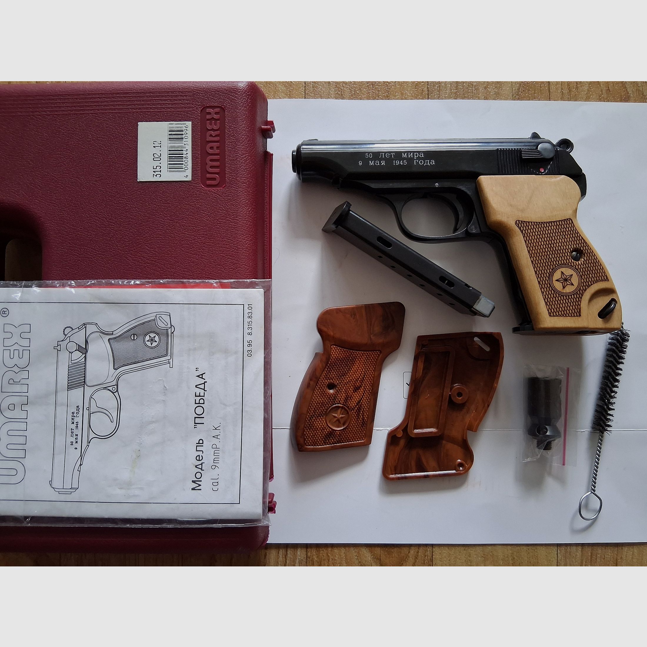 Reck Umarex Mod. Pobeda (Makarov) Cal. 9 mm P.A.K., wooden grips, spare magazine, (like new)