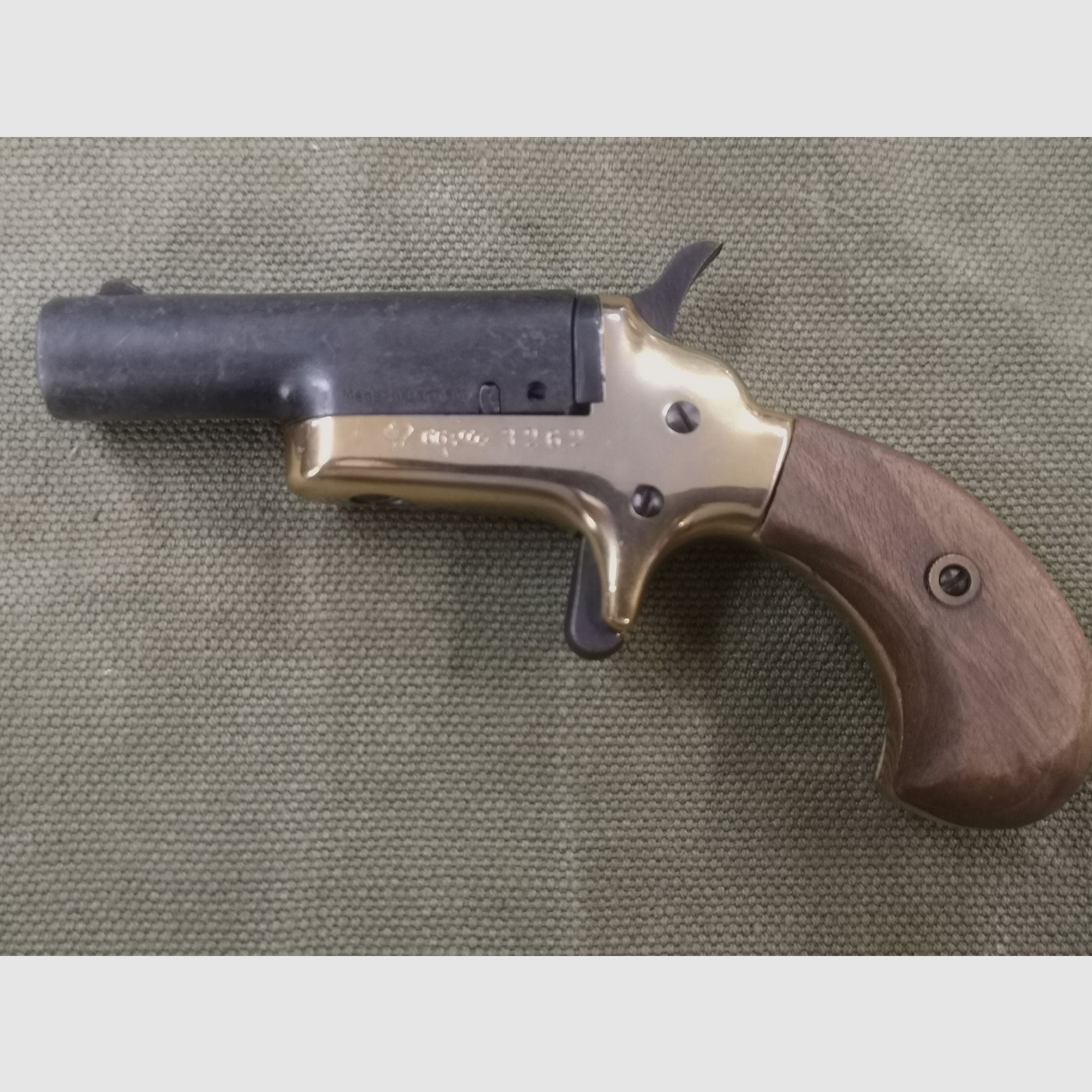 Derringer Eusta 1873  Kaliber: .22lr/.22lfb