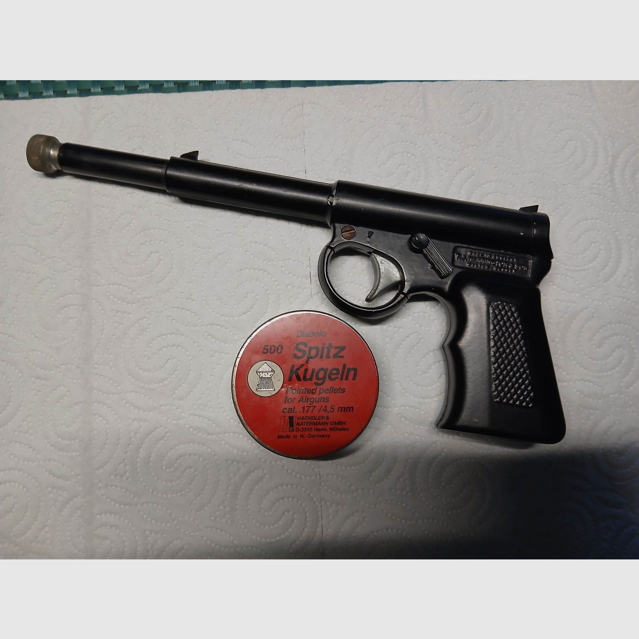 TJ Harrington “The Gat Red Box” .177 Pop-Out-Pistole.