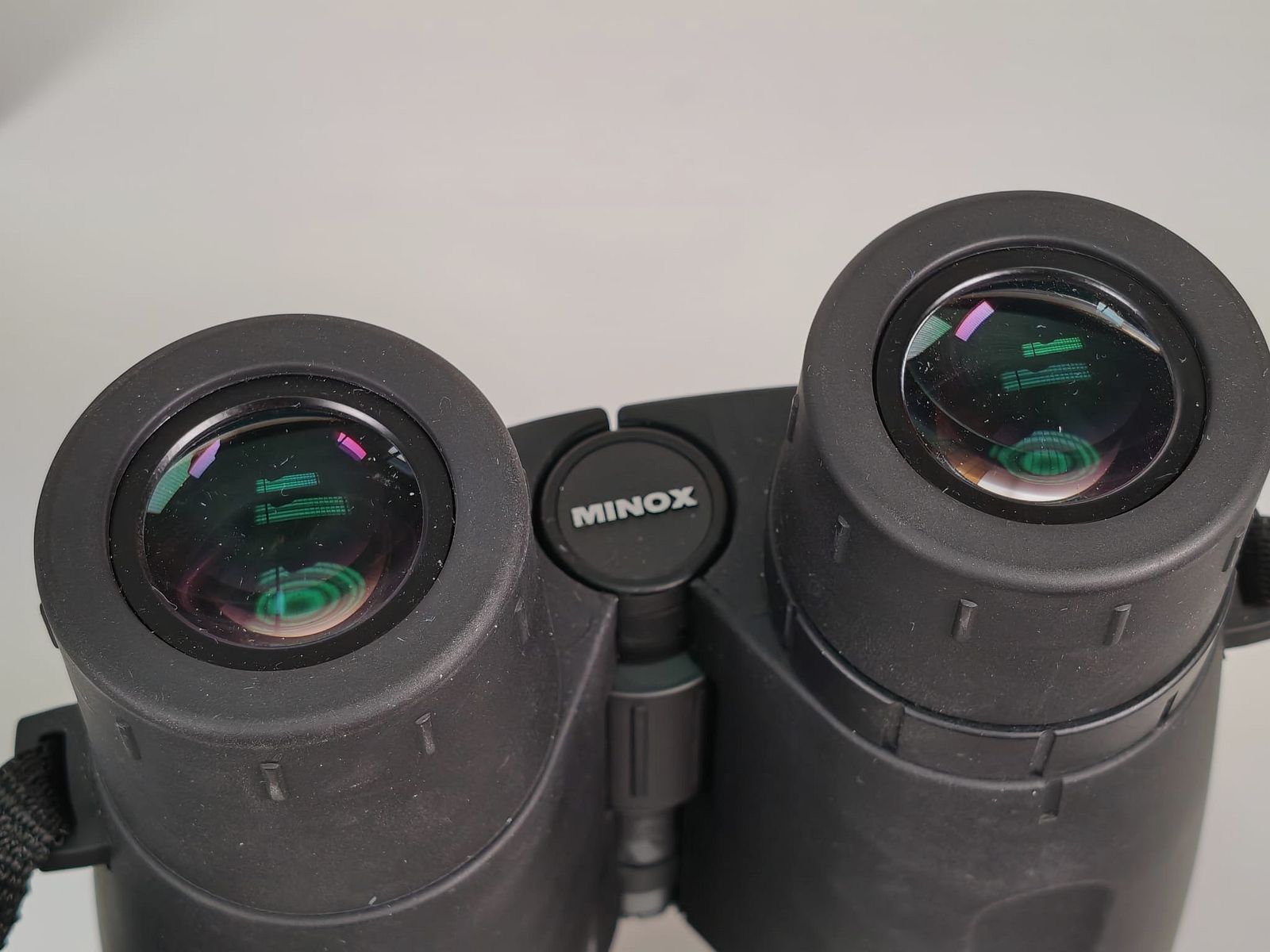 Minox BD 10x58 ED inkl. Riemen und Tasche