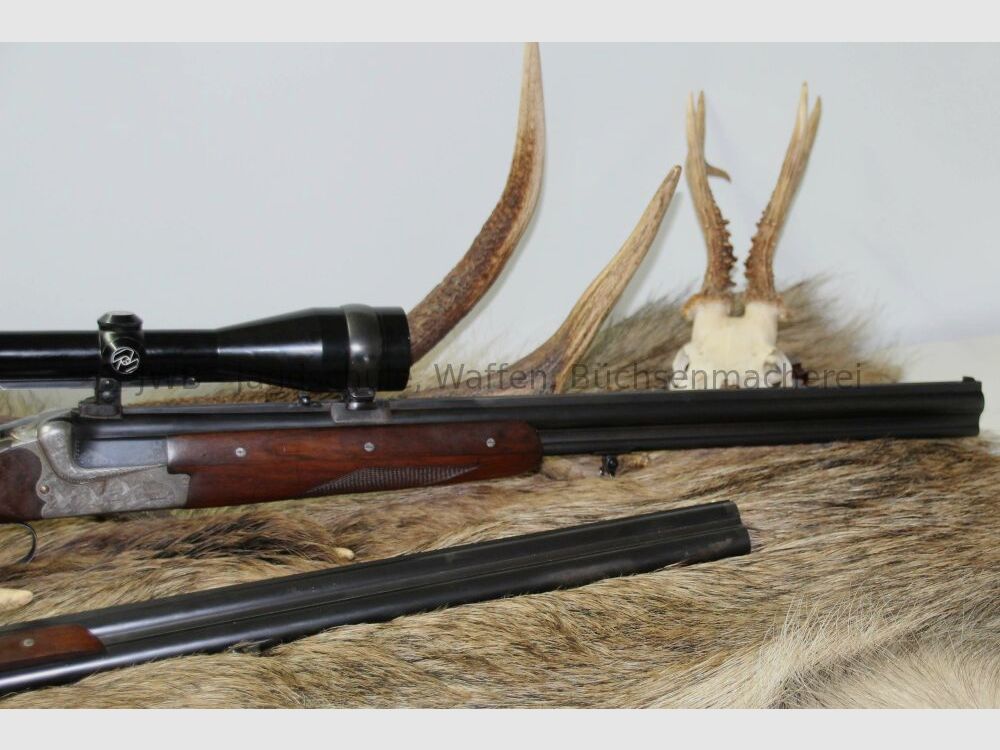 Merkel double-barreled shotgun with interchangeable double-barrel and variable sight 12/70; 7x57R