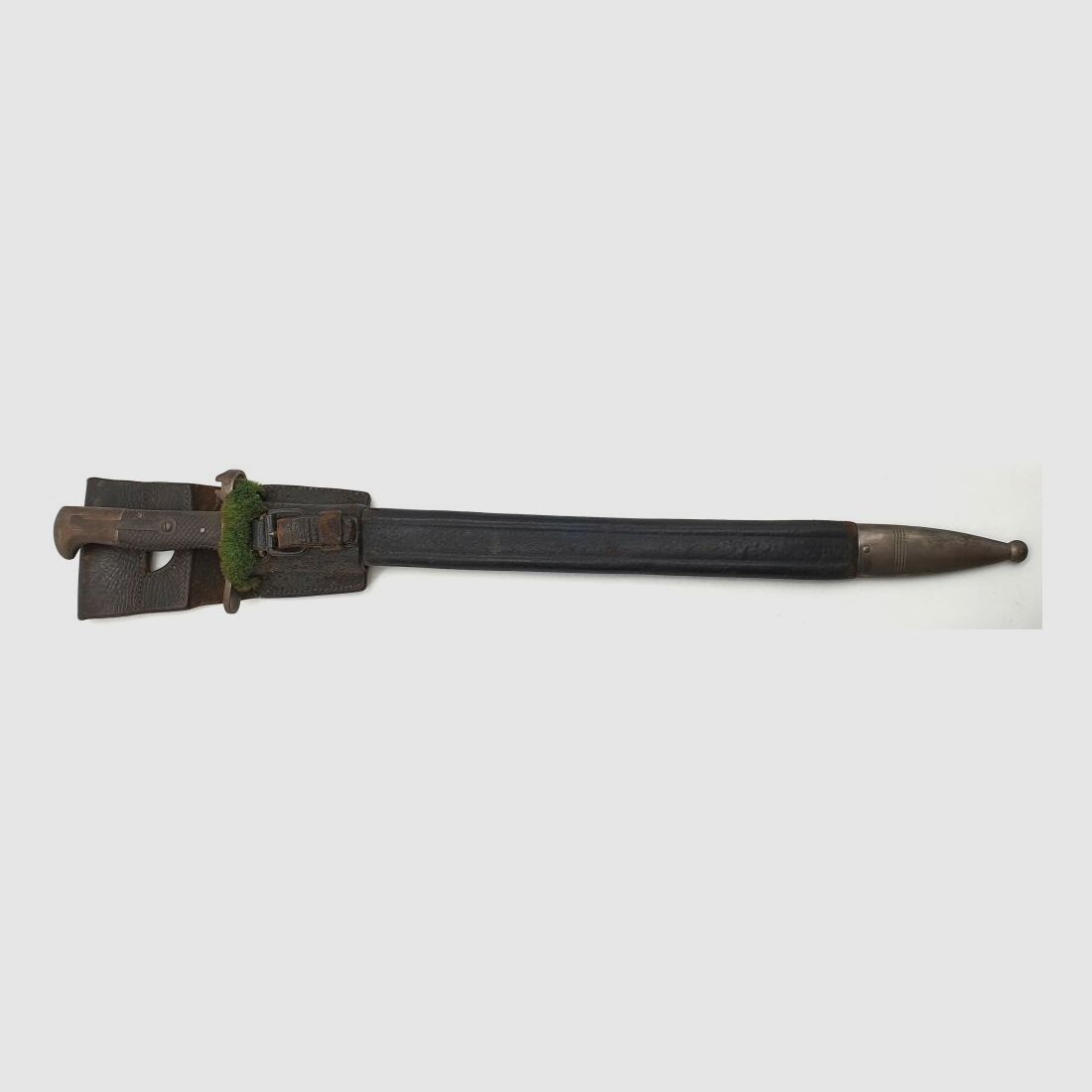 Vetterli original Vetterli bayonet with saw teeth and green fur on the scabbard