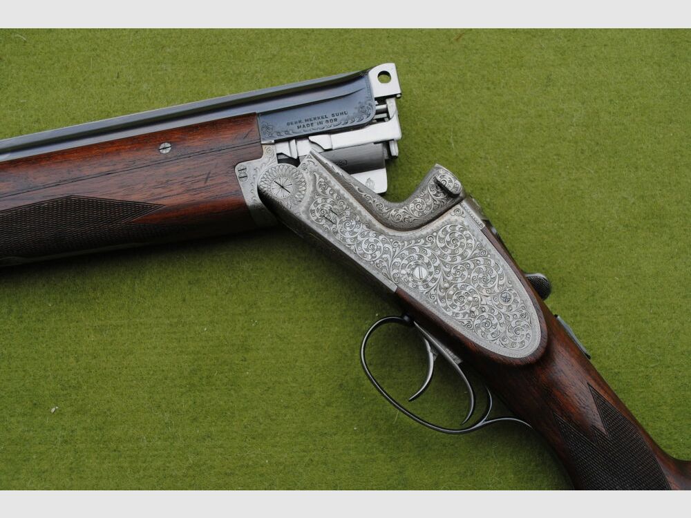 hand-engraved Merkel side lock double barrel shotgun, model 203E