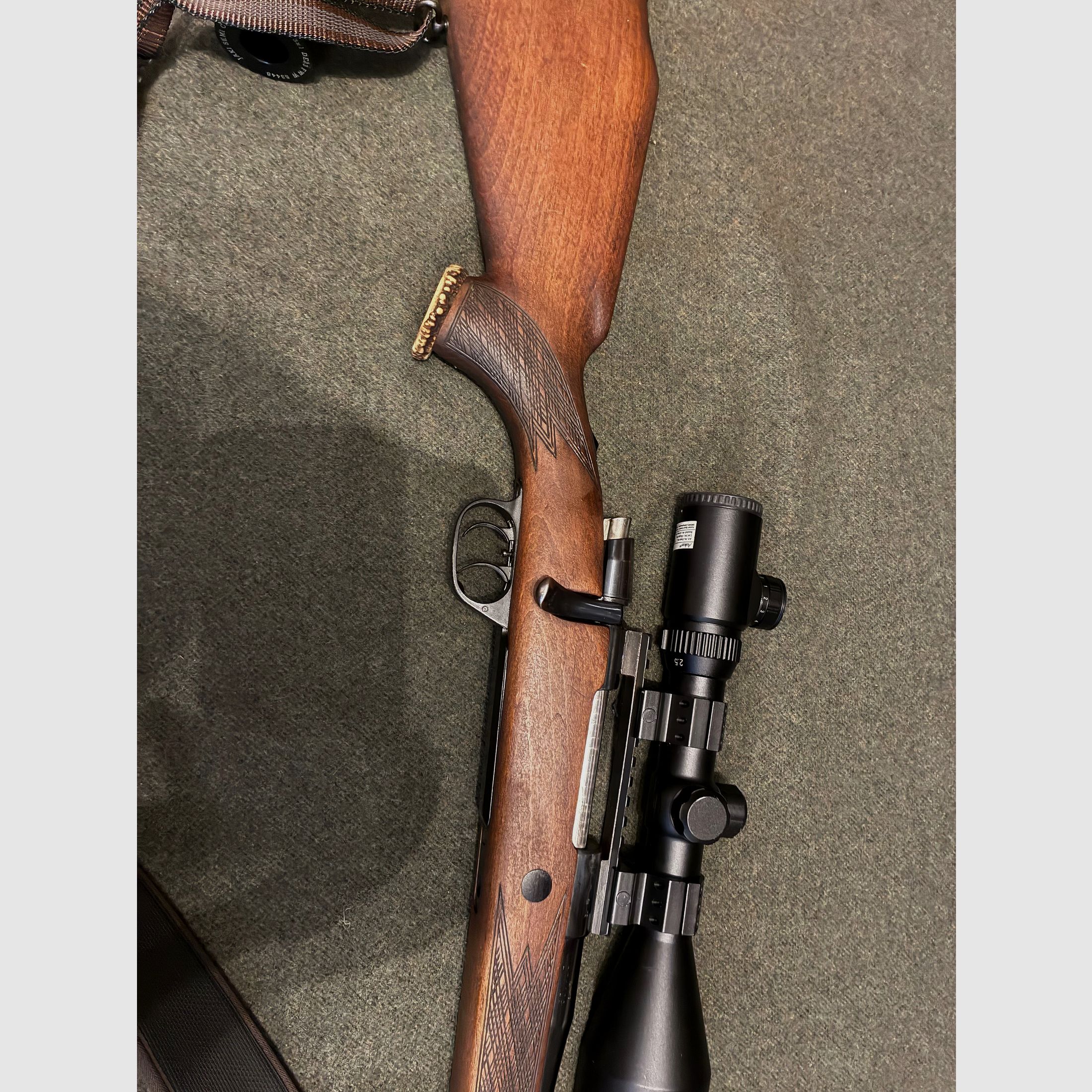 Voere repeater 7x64 with silencer and scope