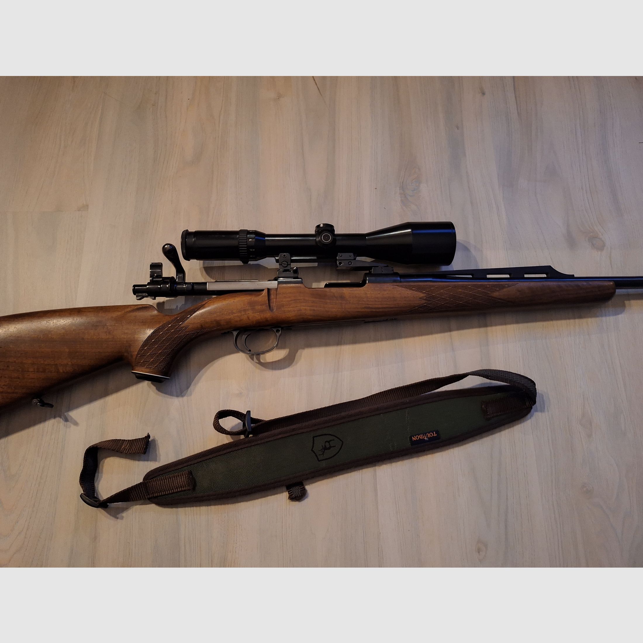 Repeater rifle based on Mauser 98 including scope 3-12x50