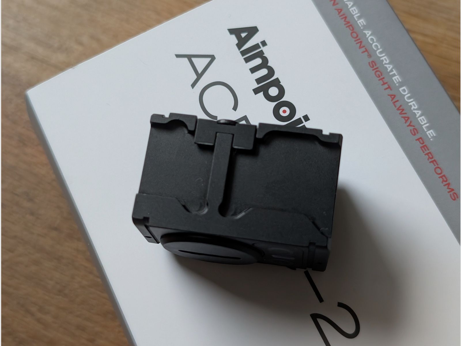 Two months old Aimpoint ACRO C-2 with receipt