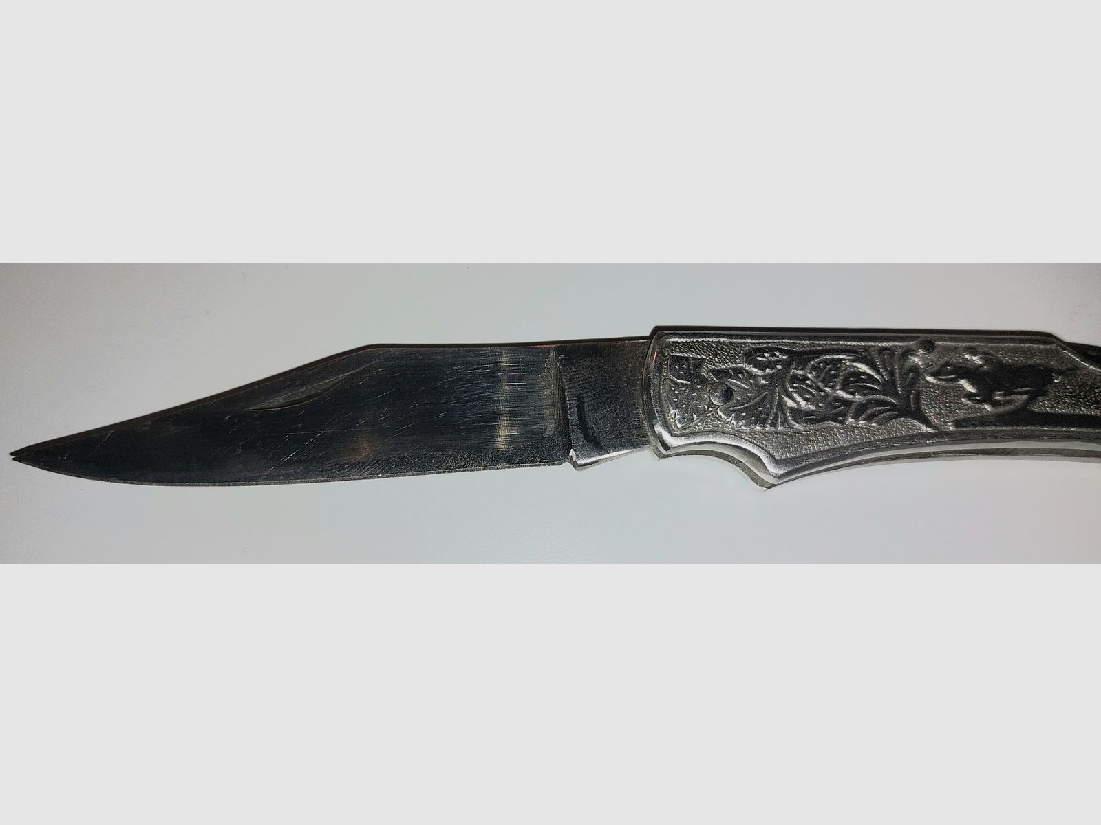 Pocket knife with rider motif, price negotiable