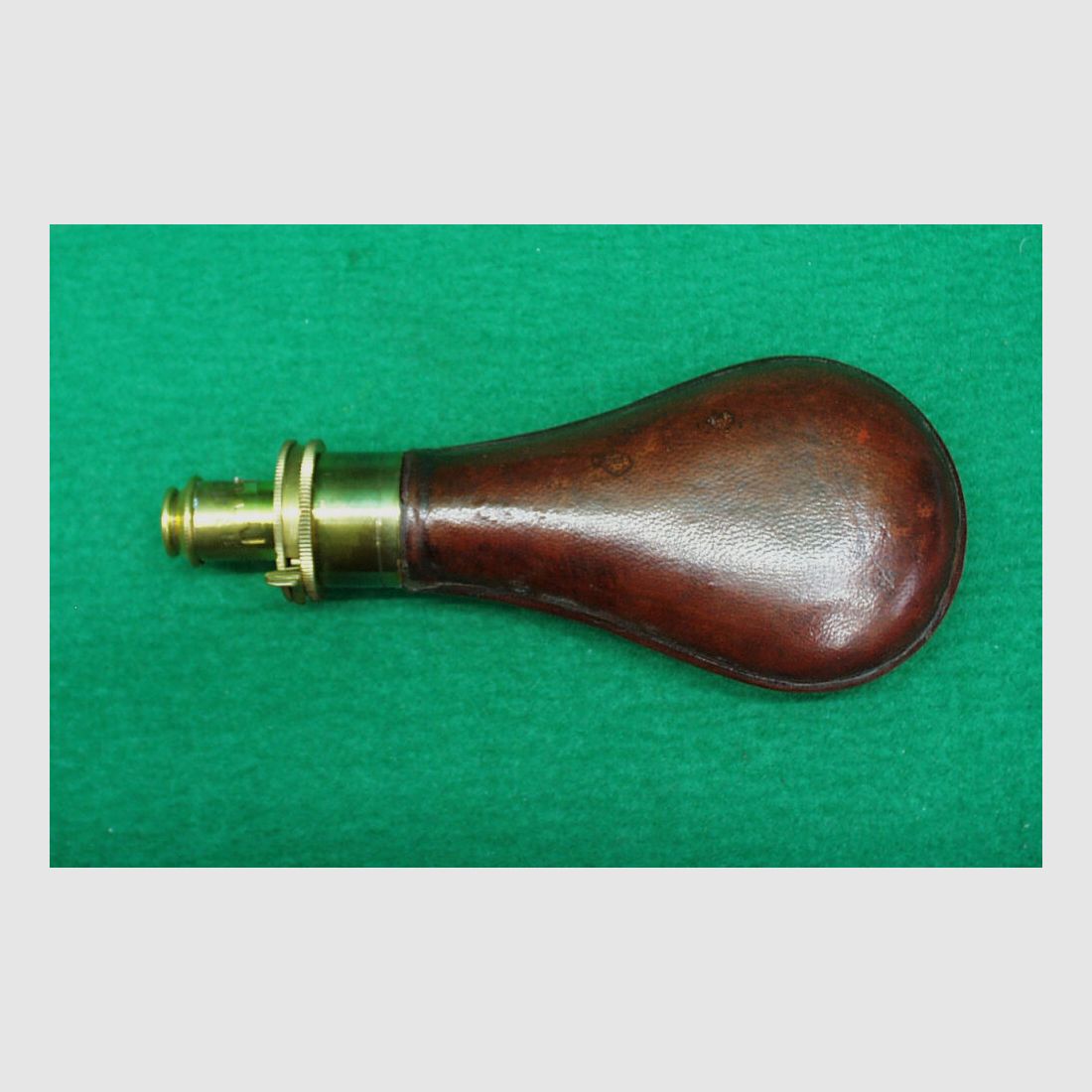 Indian powder bottle, leather