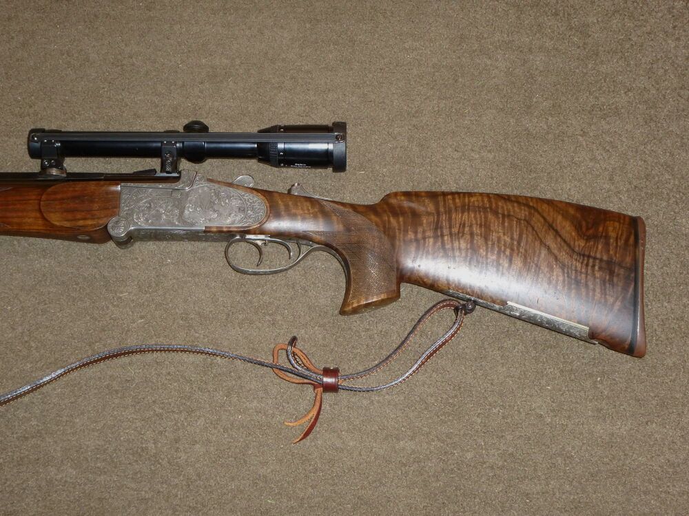 Otto Baier KS 88, zur izquierda, Cal. .416 Rigby, 6x70R