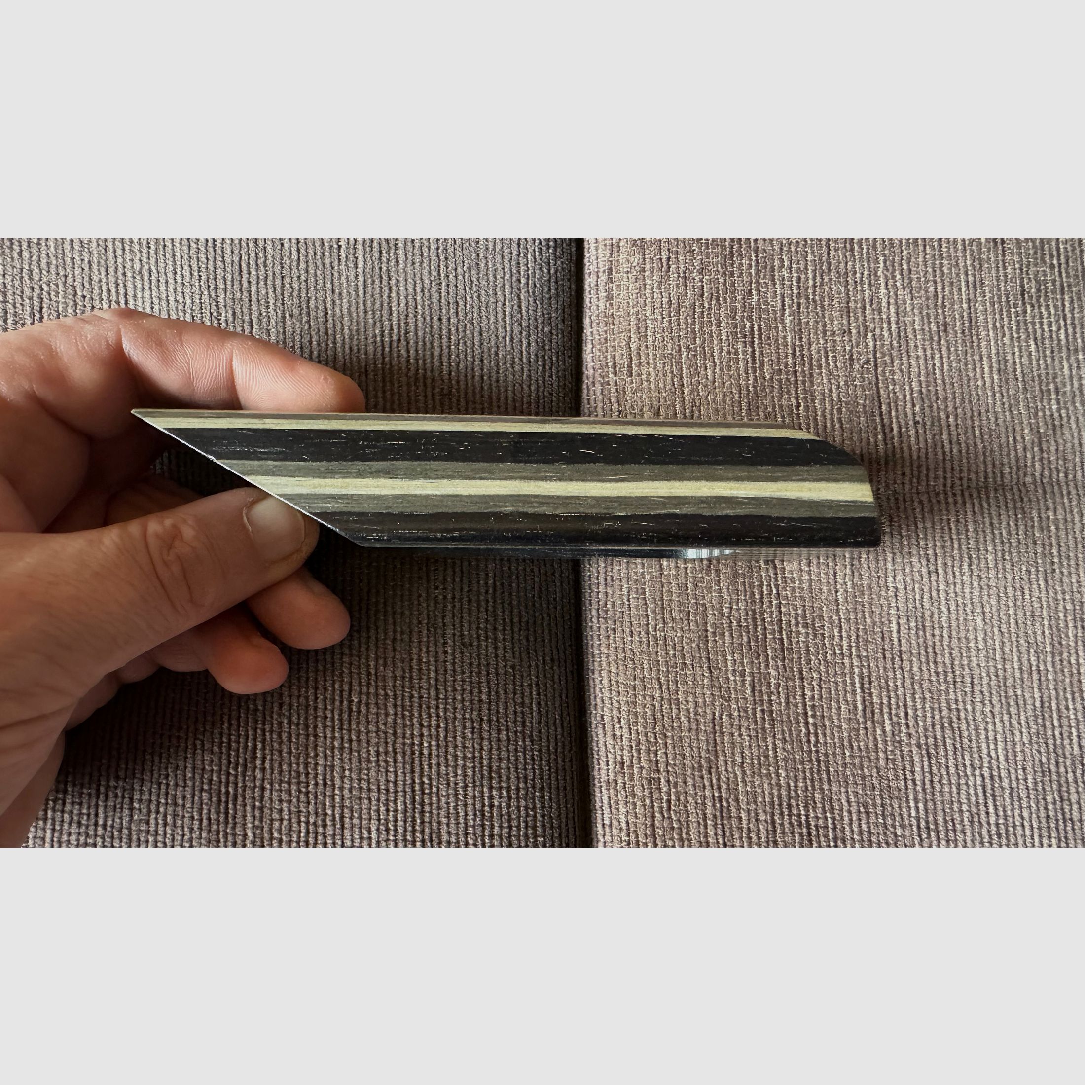 Feinwerkbau 700 cheek piece made of laminated wood.