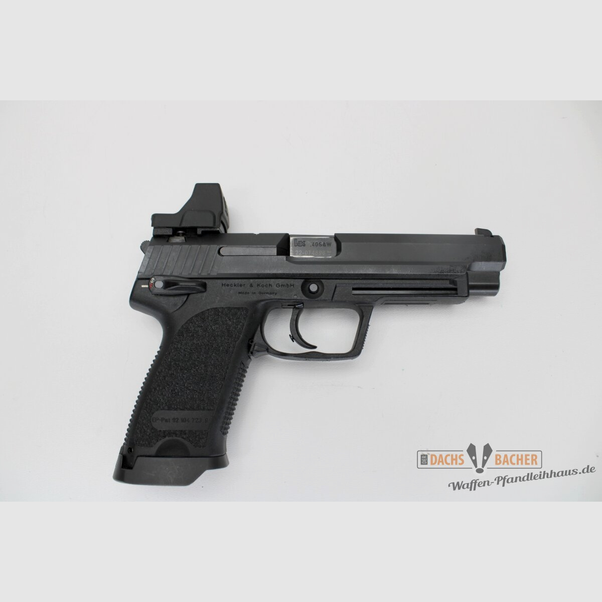 Pistol H&K HK USP EXPERT caliber .40S&W with Vortex Defender CCW and case