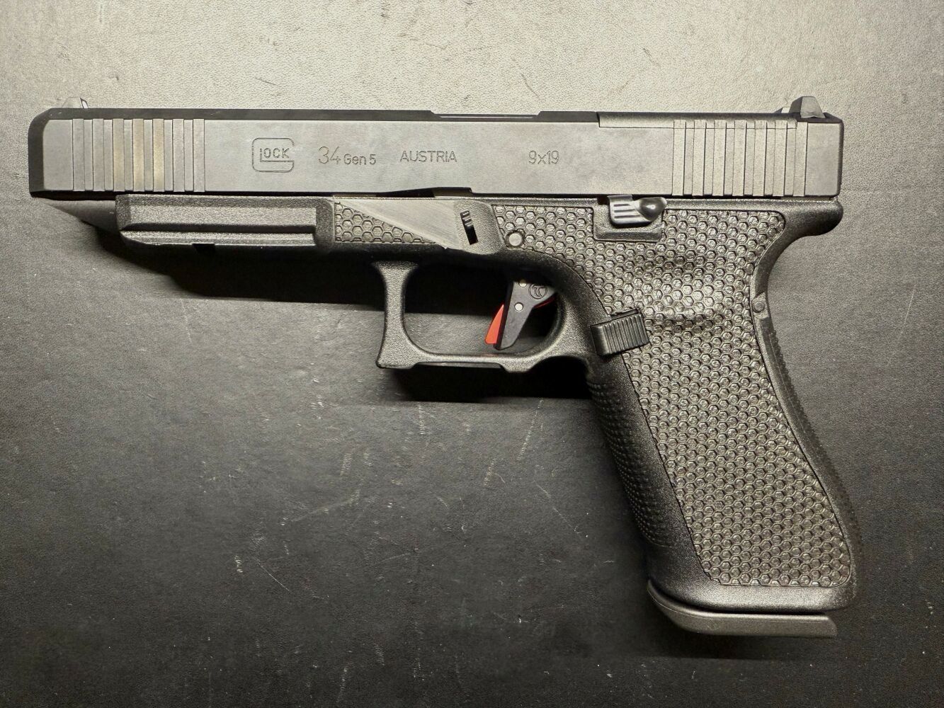 Pistolet personnalisé Glock Peterssen Gunworks 34 Gen.5 MOS personnalisé